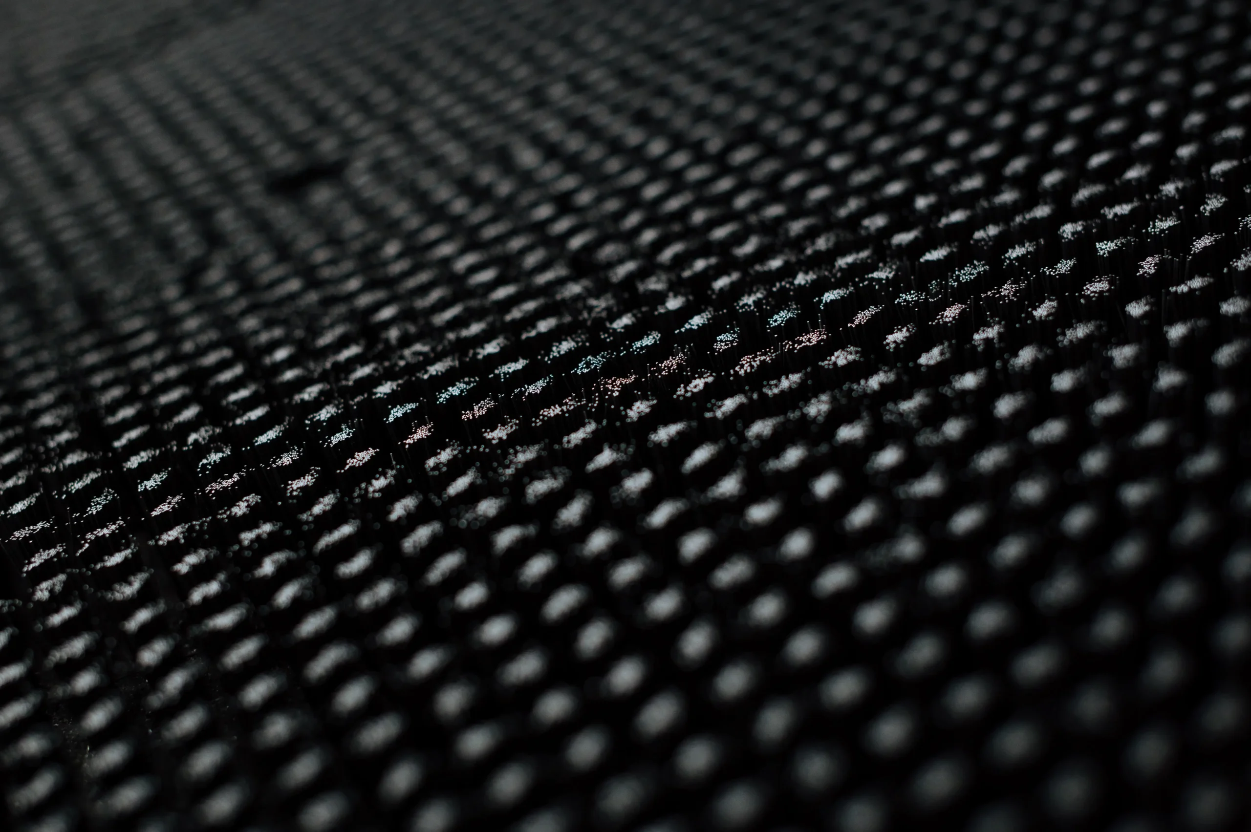 Intricate metal mesh pattern with geometric precision