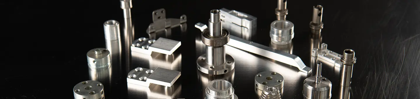 Assortment of precision-machined parts and prototypes created by Teters through CNC Turning & Milling processes