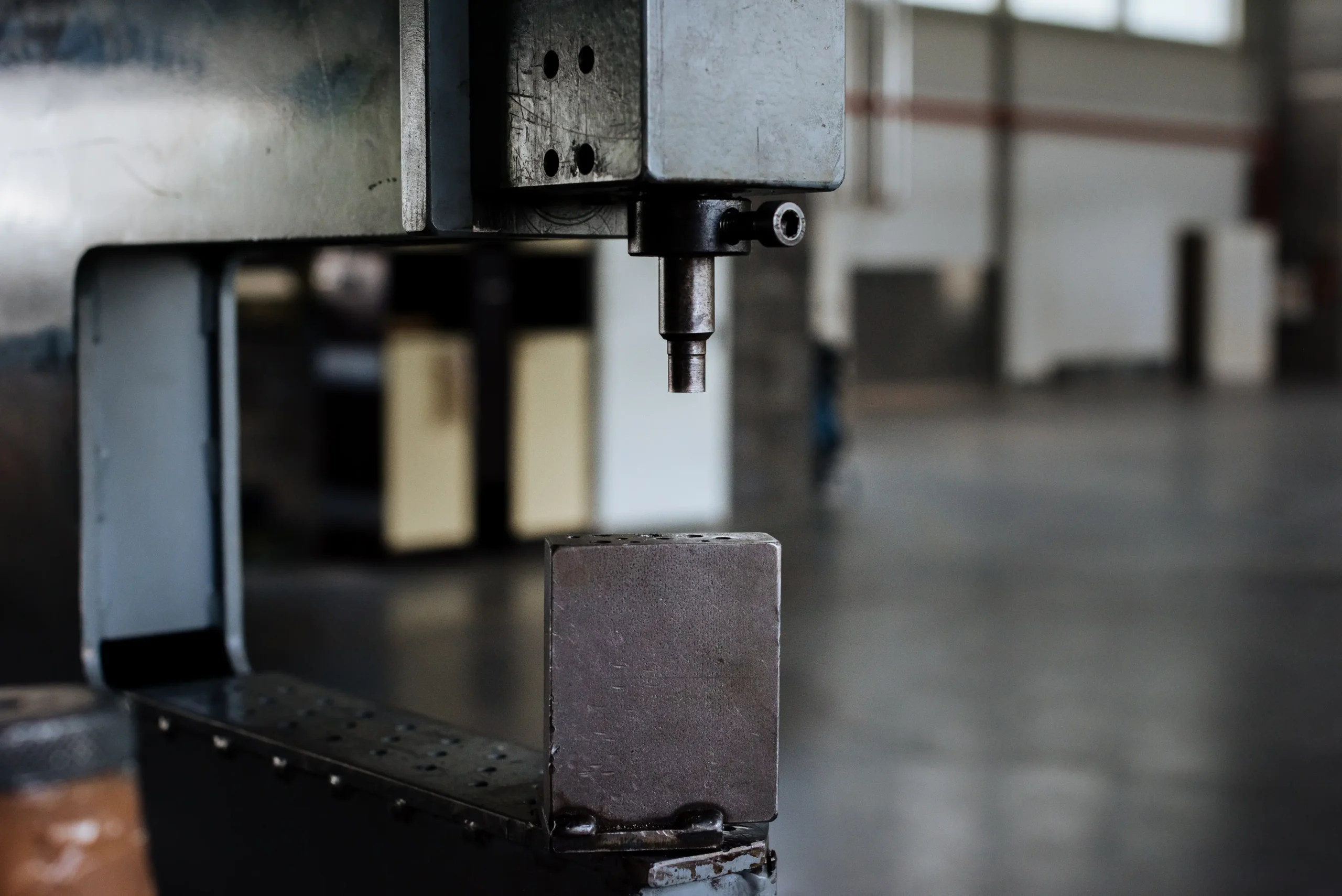 Industrial press machine used in precision metal stamping services for high-accuracy part fabrication